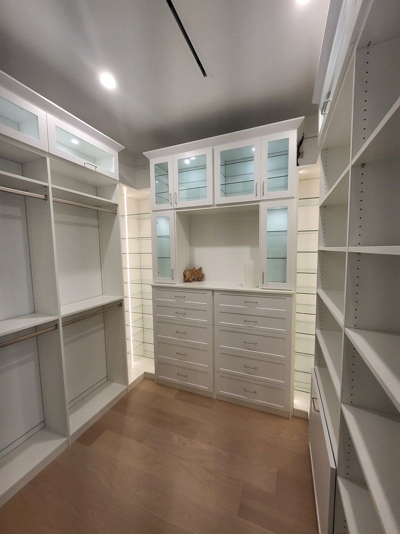 High-End Dark Wood Walk-In Closet