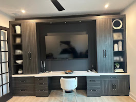 Modern media center with integrated desk and storage drawers